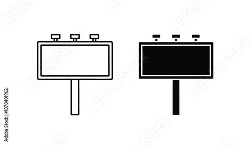Two billboard signs one blank and one filled with black color on posts
