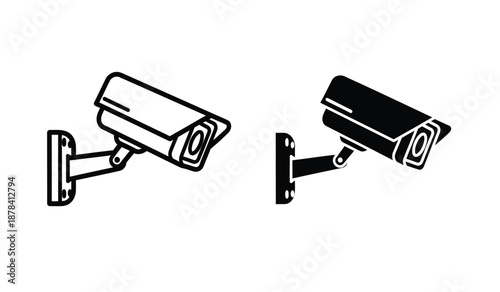 Two security cameras one white and one black mounted on wall brackets