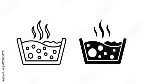 Black and white illustration of two steaming foot baths with bubbles