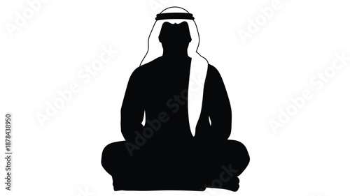 A traditional arab man in a meditative pose striking black silhouette
