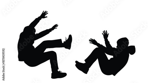 Two people in dynamic falling poses captured as a striking silhouette
