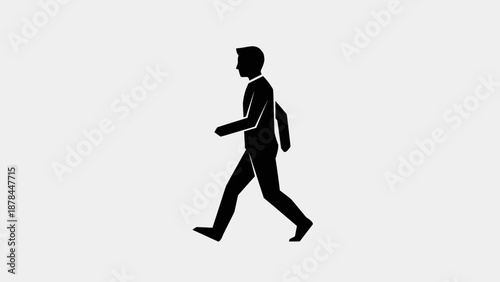 Silhouette of businessman walking, isolated on gray background.