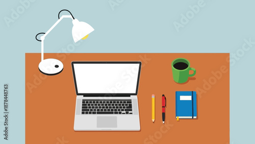 Workspace flat lay: laptop, desk lamp, coffee mug, notepad, pens