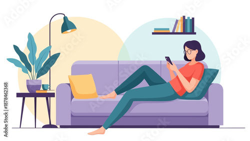Woman relaxing on a couch with a mobile phone.