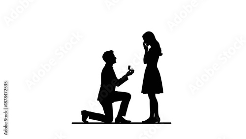 Man proposing to a woman on one knee silhouette, wedding proposal concept.
