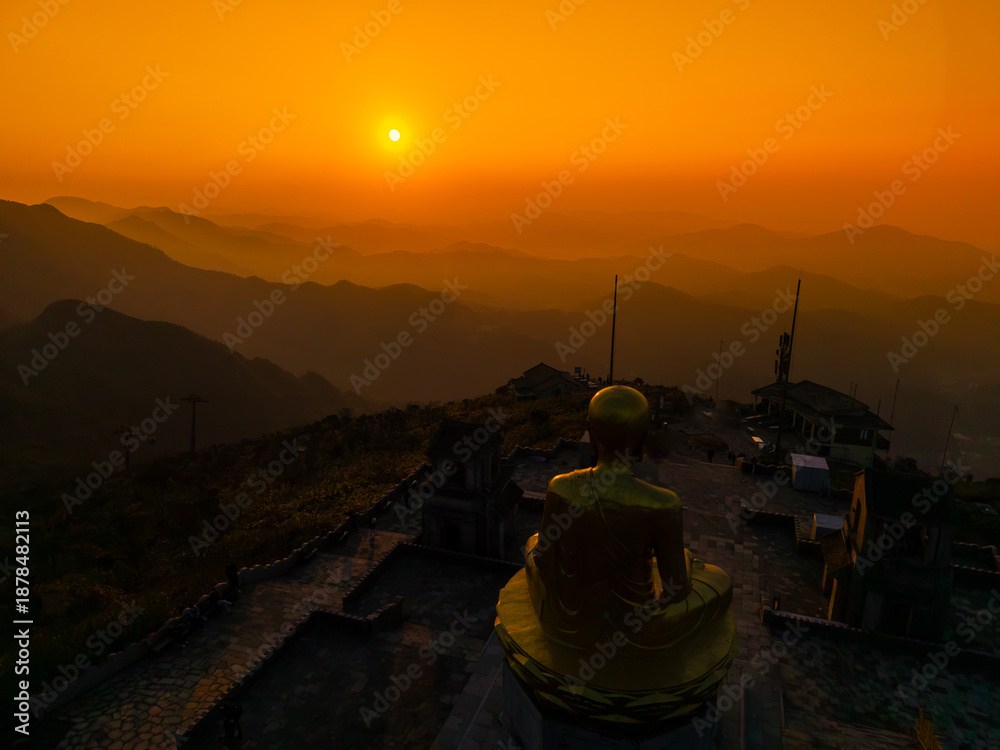 custom made wallpaper toronto digitalView of Golden statue of Buddha sitting in a lotus flower at ancient Buddhist complex at Yen Tu Mountain, Quang Ninh Province, Vietnam