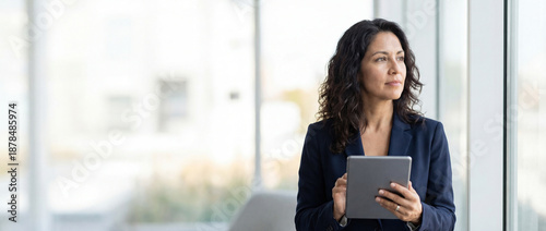 40s mature professional business leader executive woman office worker holding tablet computer isolated. Latin hispanic middle aged businesswoman thinking, dreaming looking away. Web banner, copy space