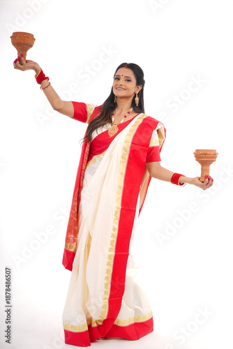 Young women celebrating durga pooja,Bengali Indian women 