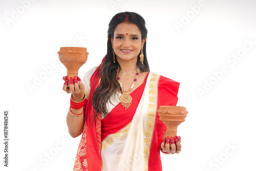Young women celebrating durga pooja,Bengali Indian women 