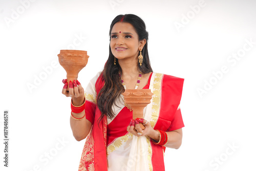 Young women celebrating durga pooja,Bengali Indian women 