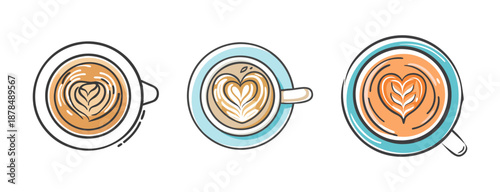 Overhead view of three cups of latte with intricate heart-shaped latte art.