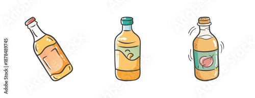 Three bottles of kombucha, a fermented tea drink, isolated on white.