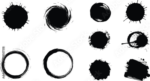 Collection of black ink brush stroke circles splashes and abstract grungy elements providing diverse artistic texture options for design