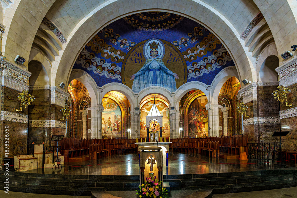 Fototapeta premium Interior of the Basilica in the Sanctuary of Lourdes, France. Mayor pilgrimage spot for Catholics