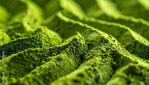 Macro close-up of fine matcha powder texture with subtle ridges on a dark background, ultra-detailed surface revealing premium tea quality, rich depth, and refined minimalist aesthetics.