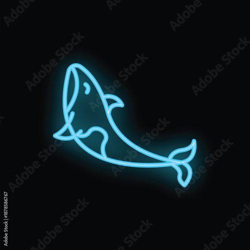Blue neon sign of a killer whale swimming upwards on black background