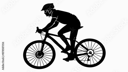 Silhouette of a person riding a bicycle with a helmet