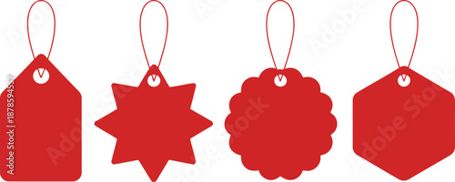 Four distinct red price tags or labels with strings hanging against a crisp white background