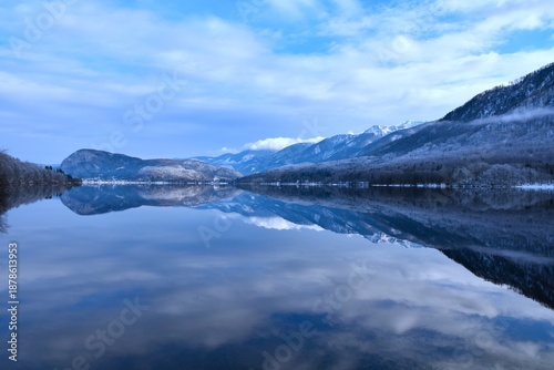 Canvas Print Winter landscape with lake Bohinj and mountains in Julian alps above in Gorenjsk