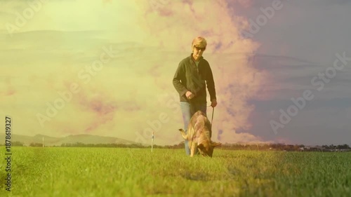 Wallpaper Mural Walking dog on grassy field under colorful sky, person enjoying animation scene Torontodigital.ca
