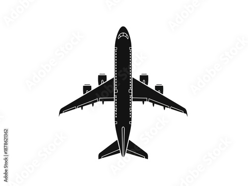 A black silhouette of an airplane viewed from above