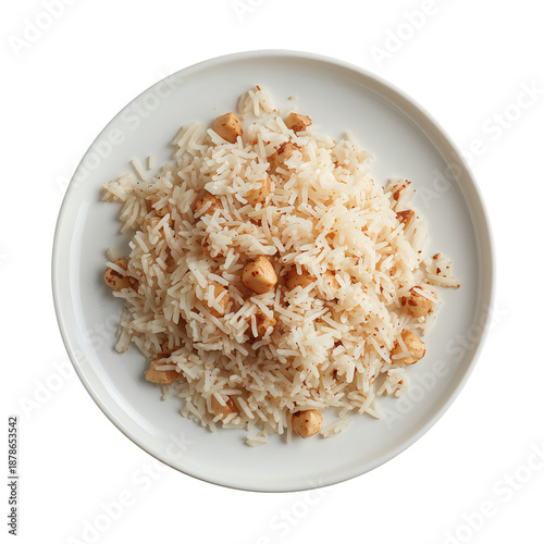 Rice Dish Served on a White Plate With Green Garnish at a Kitchen Table in Da...