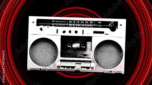 A classic 1980's era boom box cassette tape player, edited with black and white filtered effects and set against a red circular pulsating kaleidoscope background.