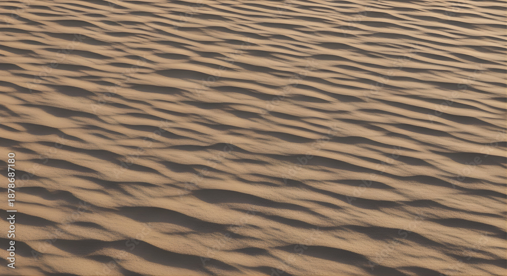 Obraz premium Abstract brown sand ripples create a textured desert dune pattern with wind-blown lines and dry summer waves in this natural sandy landscape background
