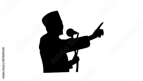 Silhouette of a Public Speaker at Microphone