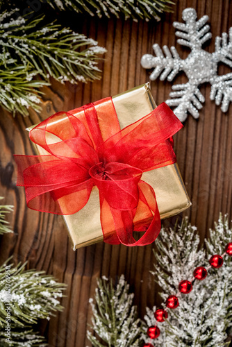 packaging christmas gifts in boxes on wooden background top view