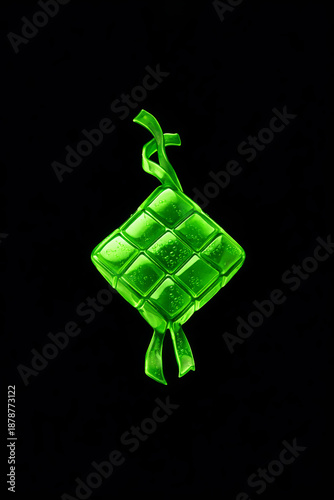 Glowing Green 3D Ketupat Icon for Eid Mubarak Celebration on Black Background. green 3D ketupat illustration, representing the traditional Southeast Asian rice cake, isolated on a solid black backgrou