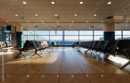Wallpaper Mural Empty waiting area with seats in a modern international airport terminal. Torontodigital.ca