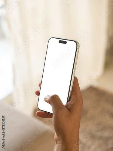 Real mobile phone on hand mockup. Isolated cellphone template. 