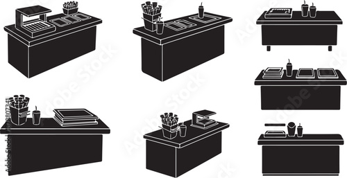 Black and white kitchen countertops with various utensils displayed