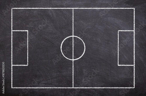 A chalkboard with a soccer field drawn on it