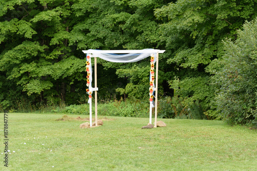 Fényképezés Simple Wedding Arch in Front of Trees