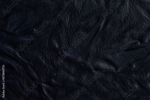 Genuine leather texture background. Navy blue artificial leather background.