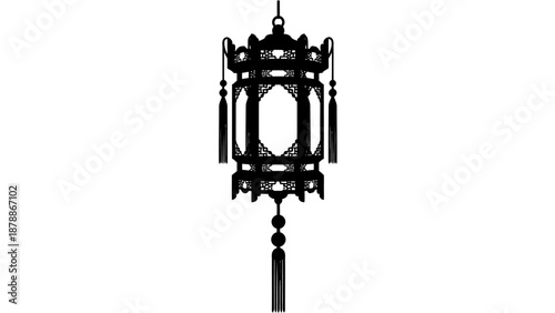 Traditional black Chinese lantern with intricate frame and tassel on isolated white background