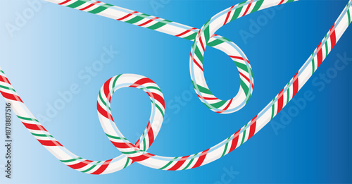 Dynamic festive red, green, and white striped candy cane ribbon creating loops against a blue background