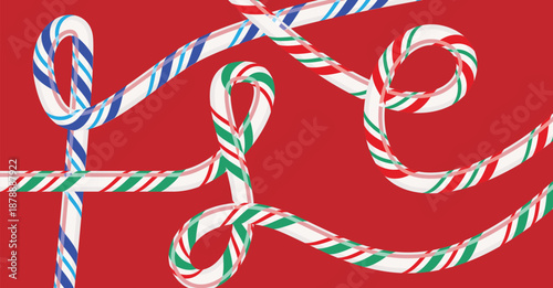 A vibrant array of festive candy canes with blue, green, and red stripes on a bright red background