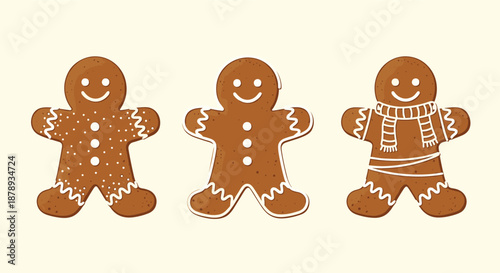 Three cute gingerbread man cookies decorated with different white icing patterns and a scarf on a plain cream background for Christmas.