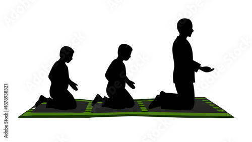 A silhouette of a father leading prayer with his two young sons standing in a row behind him on prayer mats