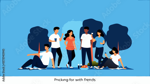 Diverse group of friends picnicking together outdoors