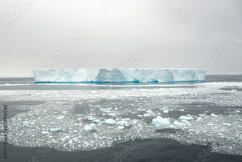 A large tabular Iceberg off the coast of Antarctica.