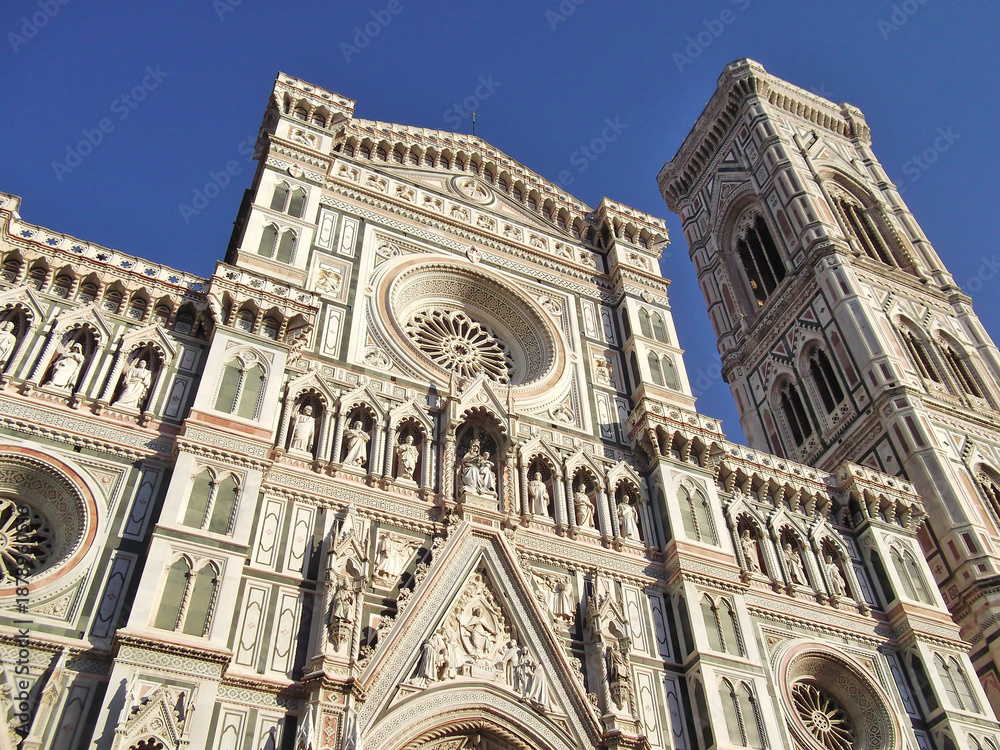 Fototapeta premium Facade and Giotto's Campanile of Cattedrale di Santa Maria del Fiore. Florence, Italy