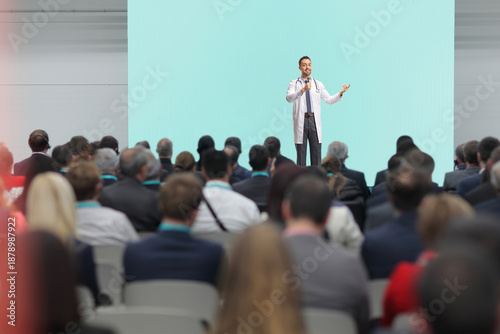 Doctor presenting on stage