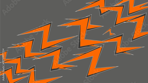 Vibrant orange lightning bolts strike against a dark grey background work environment.