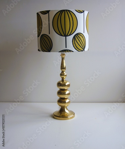 Brass table lamp from the 1960s with colorful lampshade. 