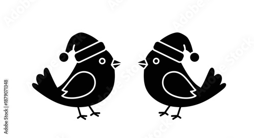 Two black birds wearing Santa hats on a white background