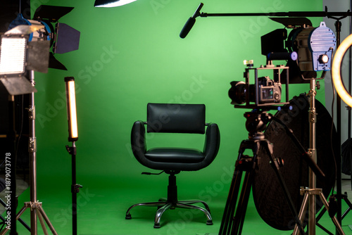 Empty studio set with green screen and production equipment